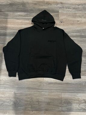 ESSENTIALS Black Pullover Hoodie with Subtle Chest Logo